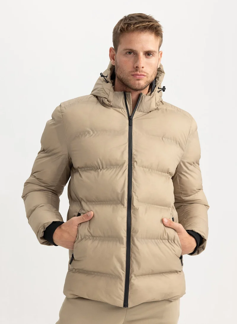 DeFacto – DeFacto Slim Fit Hooded Puffer Jacket With Lining for Men | Best Price UAE